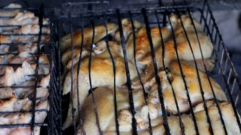 Grilling Chicken on BBQ. Chicken on the grill. Chicken meat cooking on bbq grill Stock Footage 89996705
