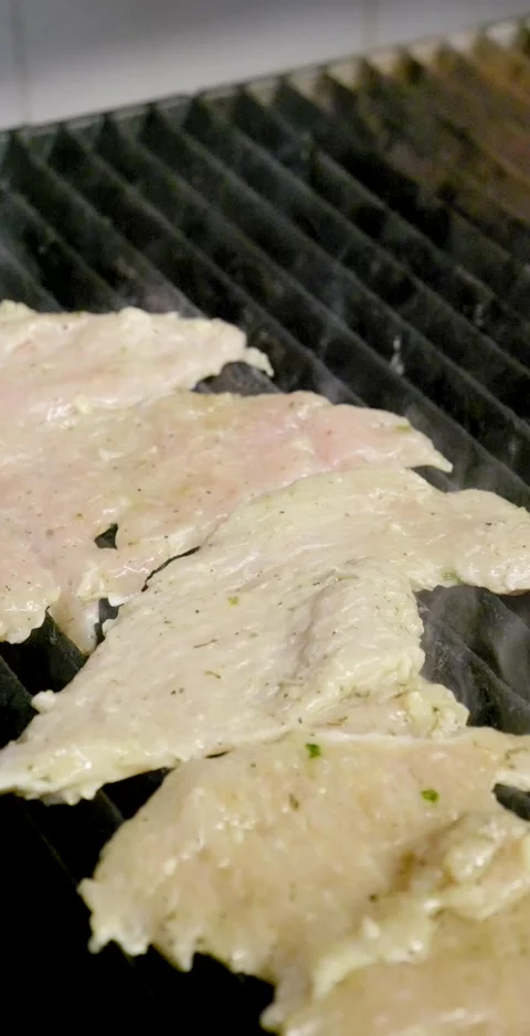 Grilling Chicken Cutlets Vertical Clip Stock Footage 138714225