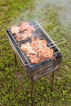 Grilling chicken Stock Photos