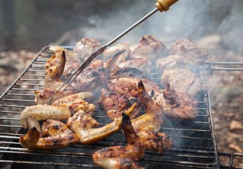 Grilling chicken Stock Photos