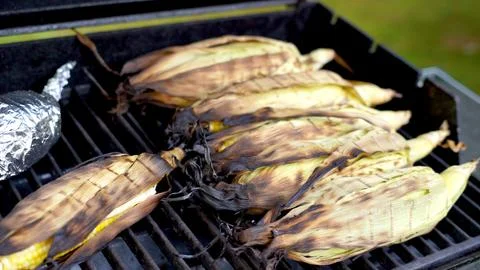 Grilling Corn on the Cob 3 Stock Photos