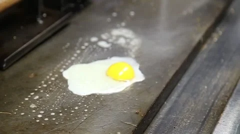 Grilling an Egg 720p HD Stock Footage 53624457