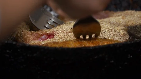 Grilling fish in a pan. Close-up 動画素材 105648877