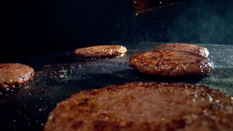 Grilling fresh burgers Stock Footage 335469657