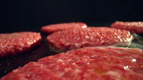 Grilling fresh burgers Stock Footage 335469710