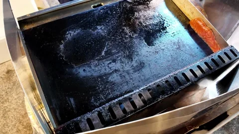 Grilling fresh salmon steak on flat plate 스톡 동영상 347528837