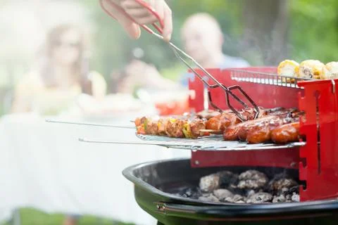 Grilling in a garden Stock-Fotos