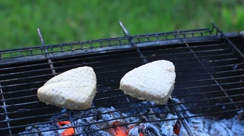 Grilling hamburgers Stock Footage 53010720
