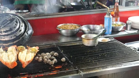 Grilling lobsters Stock Footage 278116729