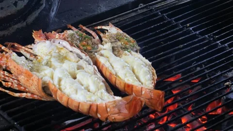 Grilling lobsters Stock Footage 278116906