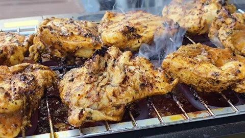 Grilling Marinated Chicken Breast on BBQ Grill Close Up Stock-Footage 344703841