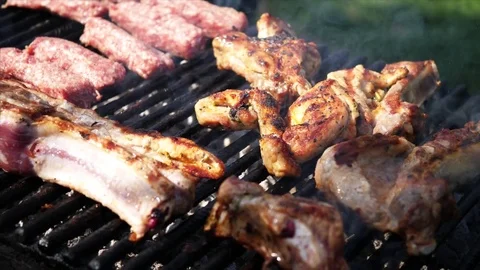 Grilling with meat. 4K Slow Video stock 77636922