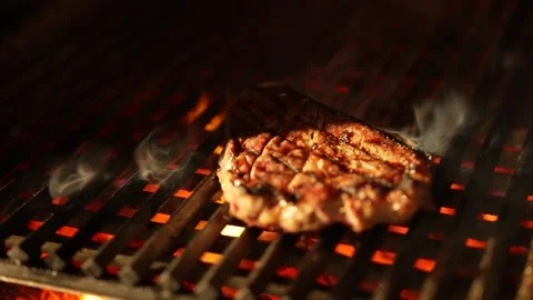 Grilling Meat on Open Flame Stock Footage 328952740