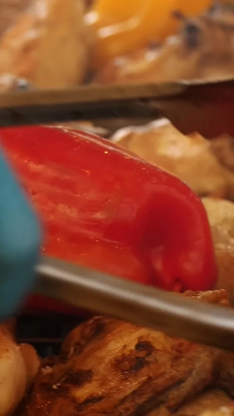 Grilling meat over burning coals. grilled vegetables. close-up. Roasting ribs Stock Footage 313236354