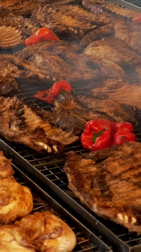Grilling meat over burning coals. grilled vegetables. close-up. Grilling food, Stock Footage 319653451