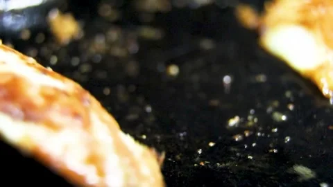 Grilling meat in pan Stock Footage 314908892