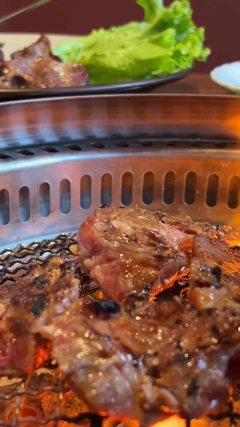 Grilling meat table steak meat with salt and pepper. Beef steak grilled on a Stock Footage 316235832