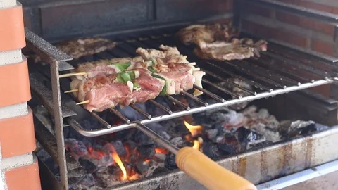 Grilling meat with vegetables on fire Video stock 116736772