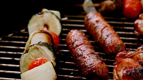 Grilling meats and vegetables Stock Footage 88059616