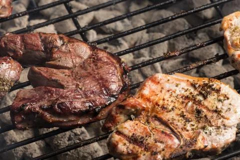 Grilling meats Stock Photos