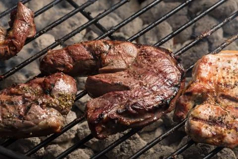 Grilling meats Stock Photos