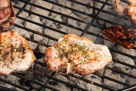 Grilling meats Stock Photos
