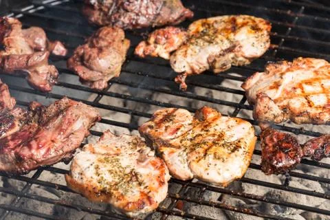 Grilling meats Foto stock