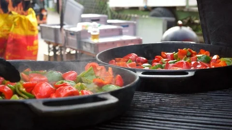 Grilling pepper on a barbecue in a pan Stock Footage 96058378
