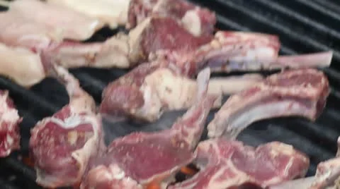 Grilling pork chops CU Stock Footage 11136261
