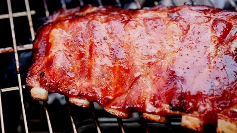 Grilling pork ribs Stock Footage 88060513
