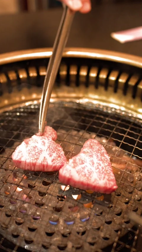 Grilling Premium Marbled Wagyu Beef on Japanese Charcoal BBQ Stock Footage 337768704