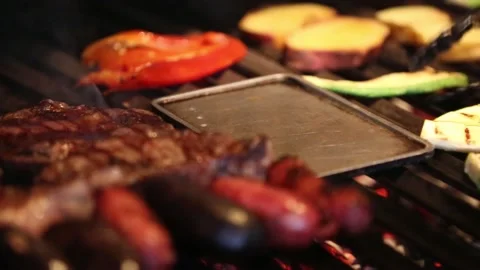 	grilling raw vegetables in a barbecue Stock Footage 131987454