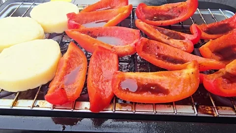 Grilling Red Bell Pepper Slices and Cheese on BBQ Grill Stock-Footage 344703927