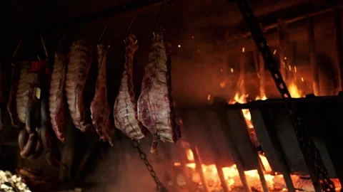 Grilling ribs at a restaurant Vídeos de archivo 296332485