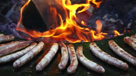 Grilling sausage macro Stock Footage 67967462