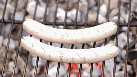 Grilling sausages Stock Footage 110257248