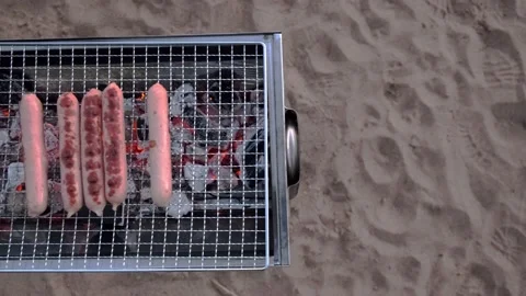 Grilling sausages Stock Footage 153981194