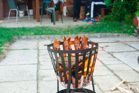 Grilling sausages. Stock Photos
