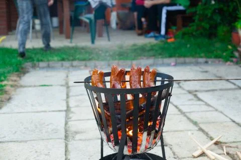Grilling sausages. Stock Photos