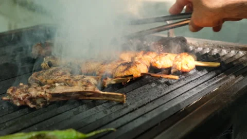 Grilling steak on bbq Stock Footage 247994713