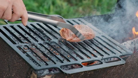 Grilling a steak with fire Stock Footage 286346917