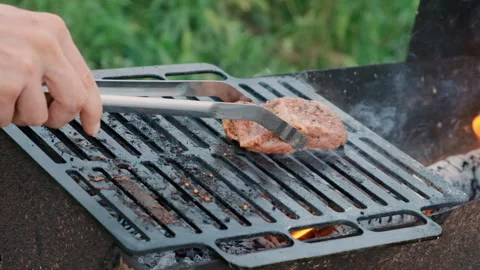 Grilling a steak with fire Stock Footage 286355379