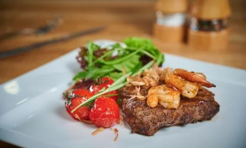 Grilling steak Stock Photos