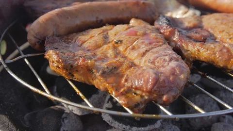 Grilling steaks on the grill plate, close up, 4k grilled meat, bbq, barbecue Stock Footage 116474449