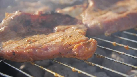 Grilling steaks on the grill plate, close up, 4k grilled meat, bbq, barbecue Stock Footage 116474493