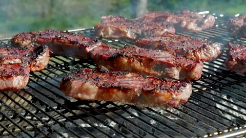 Grilling Steaks Tracking Shot Stock Footage 90011754