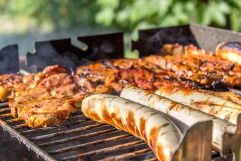 Grilling at sunset Stock Photos