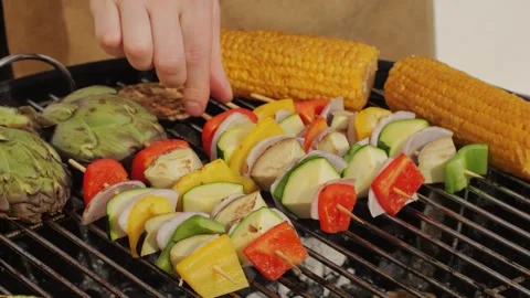 Grilling Vegetables and Corn for a Barbecue with Friends Stock Footage 301953927