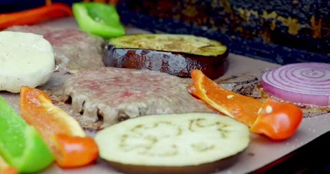 Grilling Vegetables and Meat on a Hot Grill Surface Stock Footage 323334750