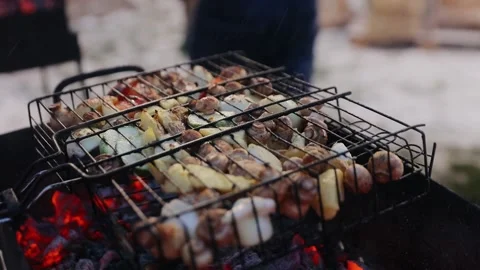 Grilling vegetables on the outdoor kitchen. Chef cooking potatoes, mushrooms Stock Footage 134208418